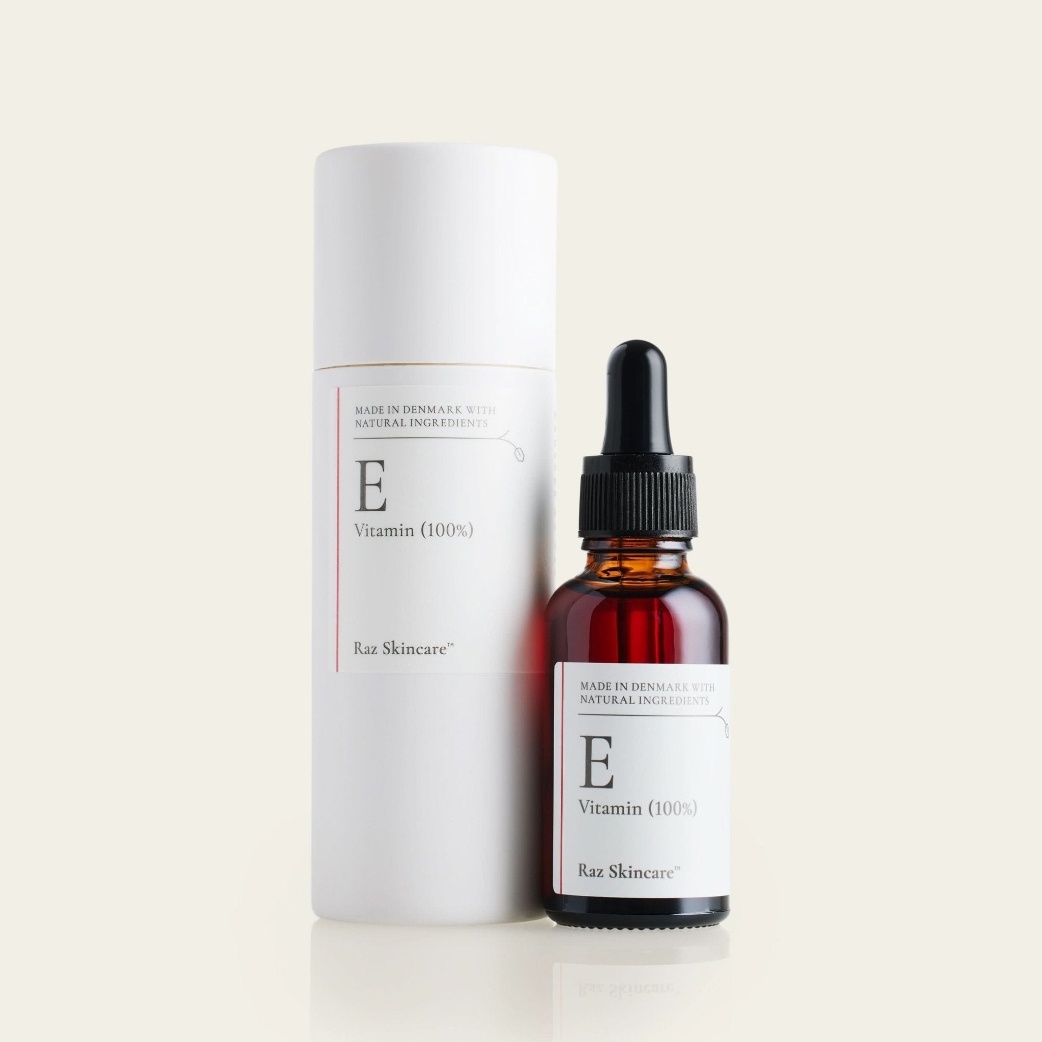 100% E-Vitamin ved siden af sin emballage
